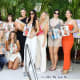 Models pose with their spreads in the 2023 SI Swimsuit Issue.
